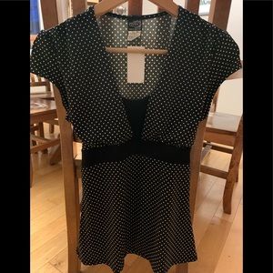 Get ready for spring with this beautiful Thx shirt/blouse!